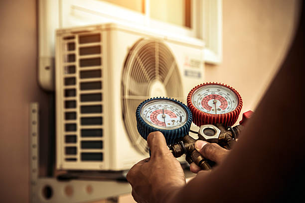 Professional Air Conditioning Service technician working in Pleasant Hill, CA